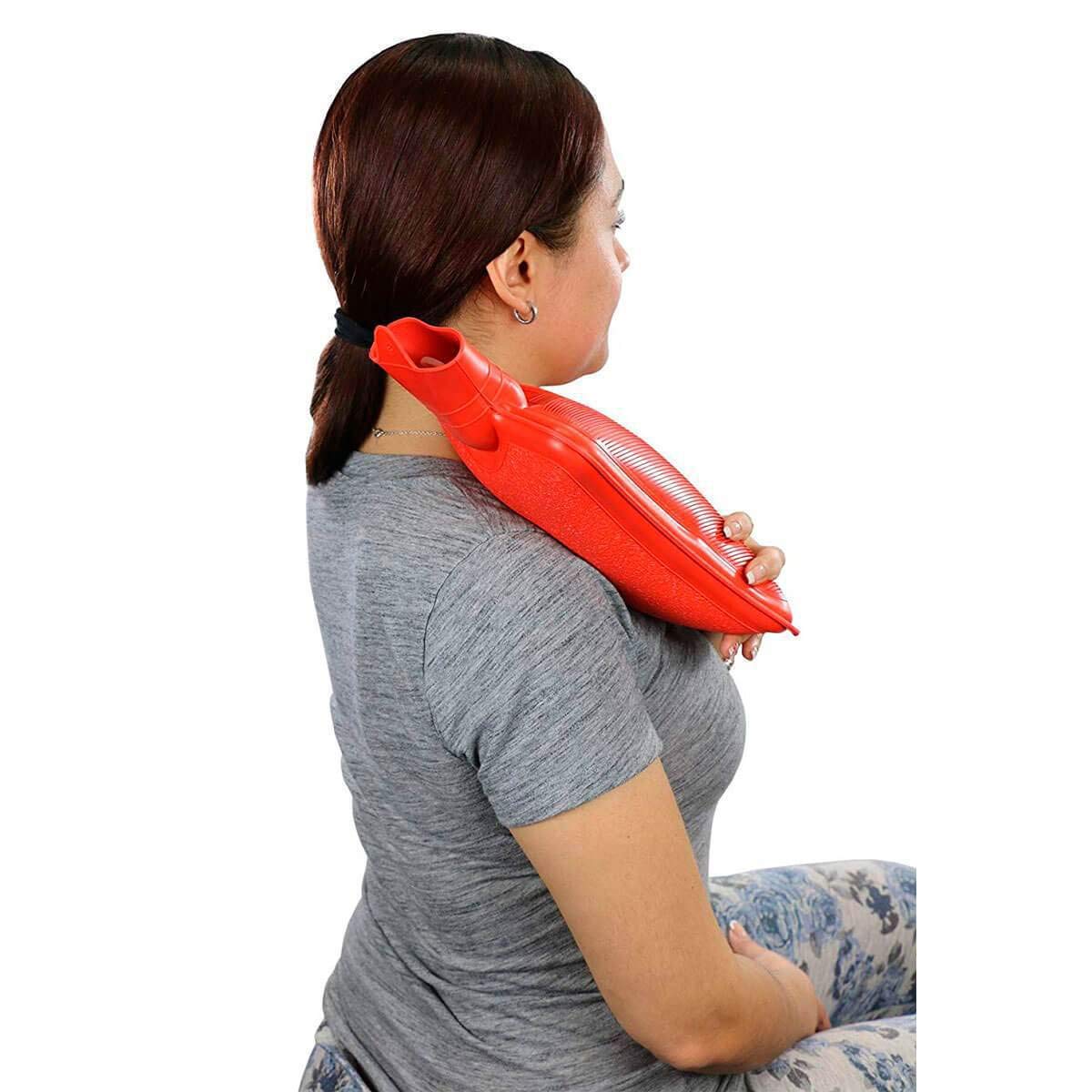 Relief Pak hot water bottle being used as a hot compress