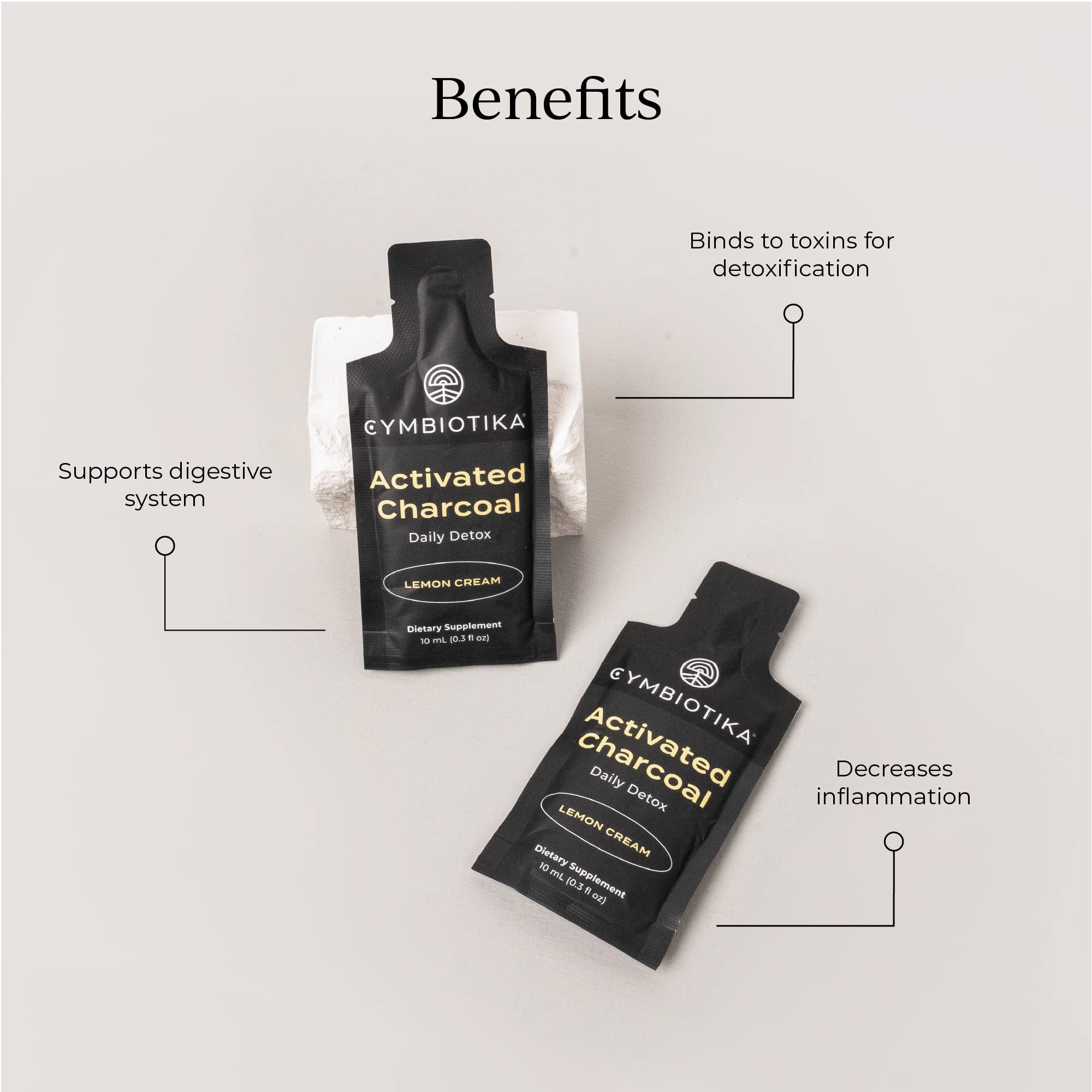 Cymbiotika coconut charcoal liquid detox 10ml pouches displayed neatly