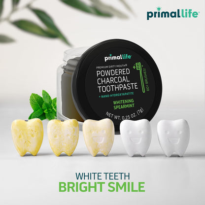 Primal Life Organics charcoal tooth cleaning powder open container showing natural black powder consistency