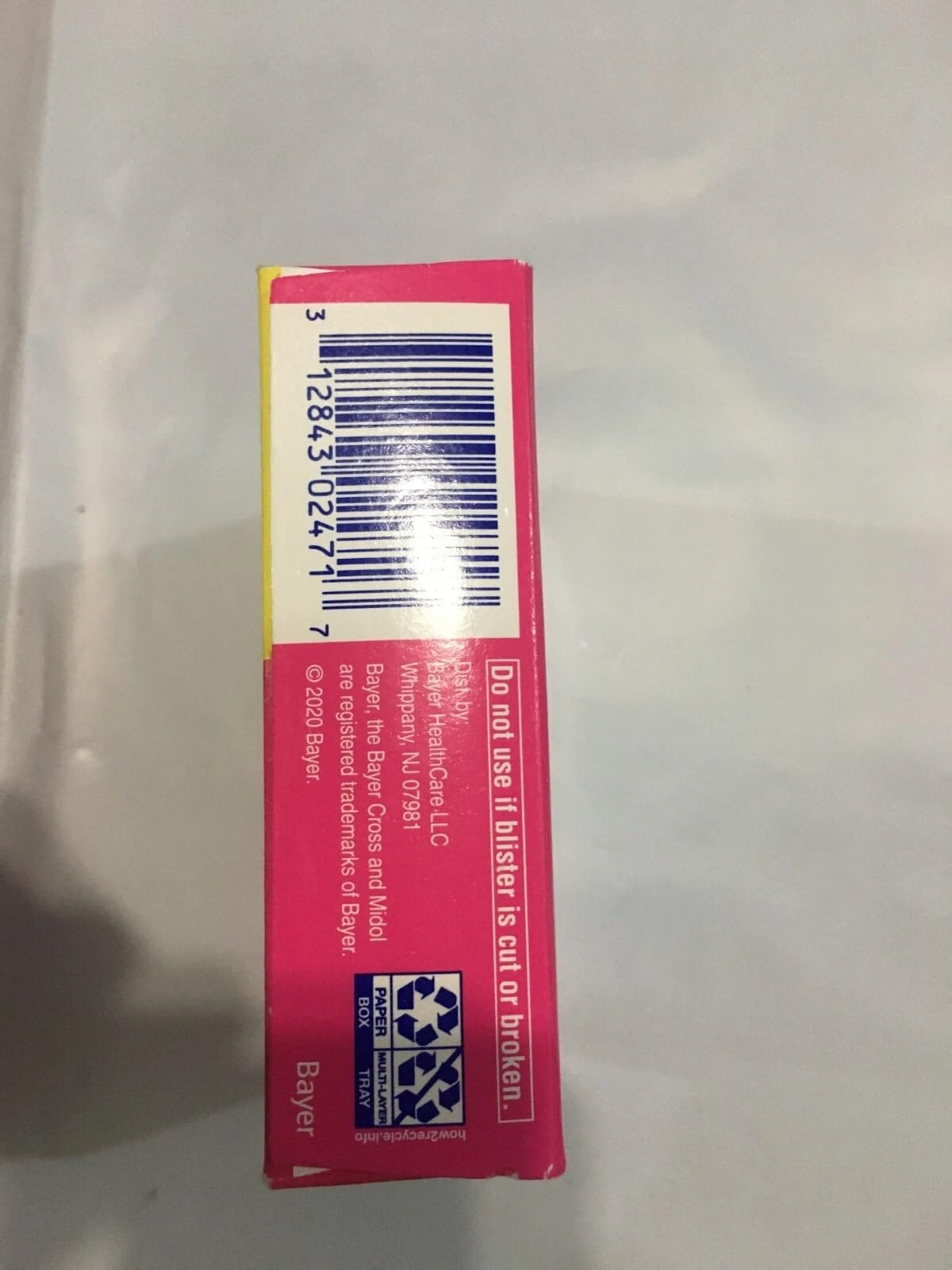 Authentic Midol Complete menstrual pain reliever caplets product close up view