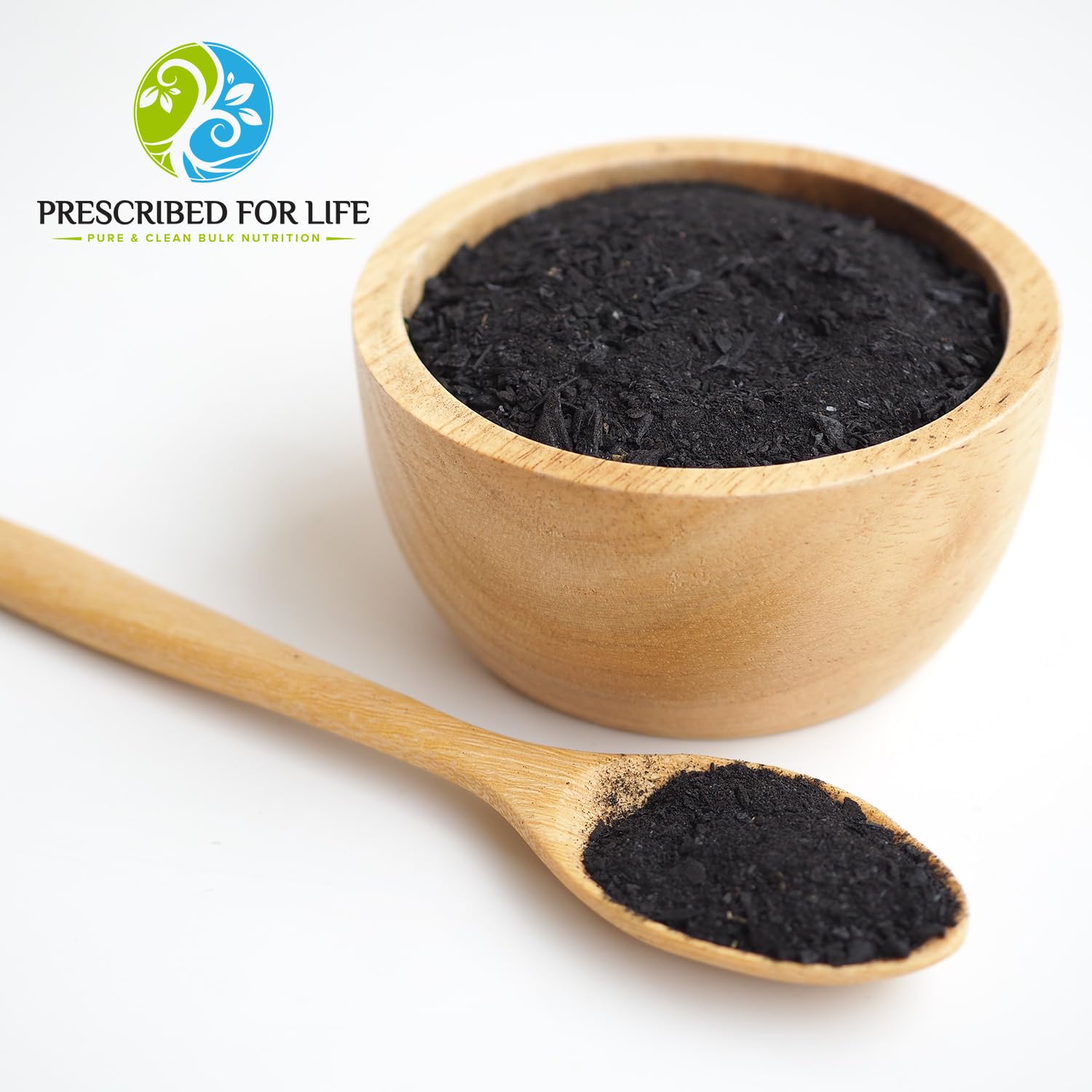 Ultra fine coconut shell charcoal powder texture close up view.