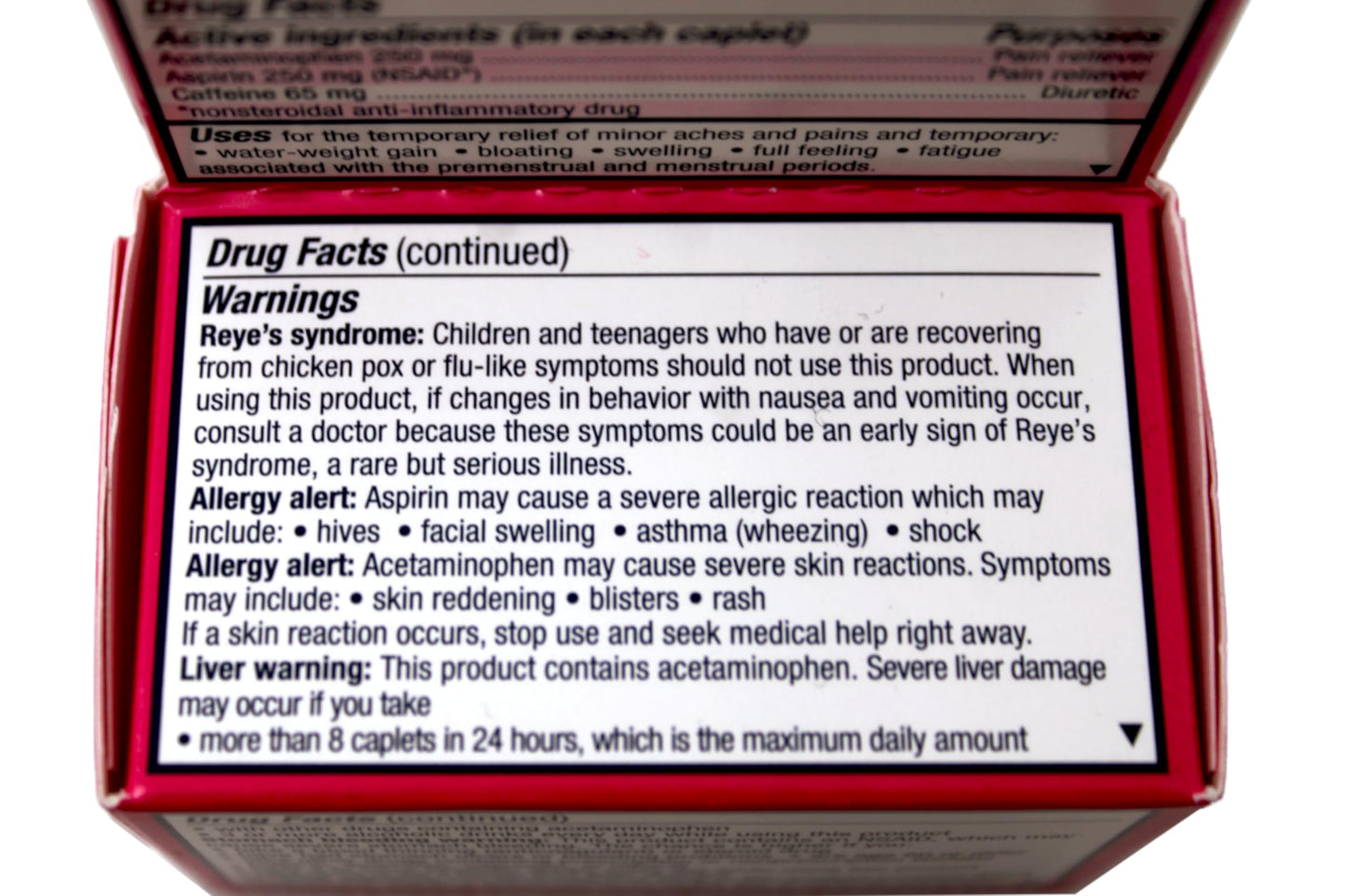 Side view of Pamprin Max menstrual relief box containing 24 pink caplets.