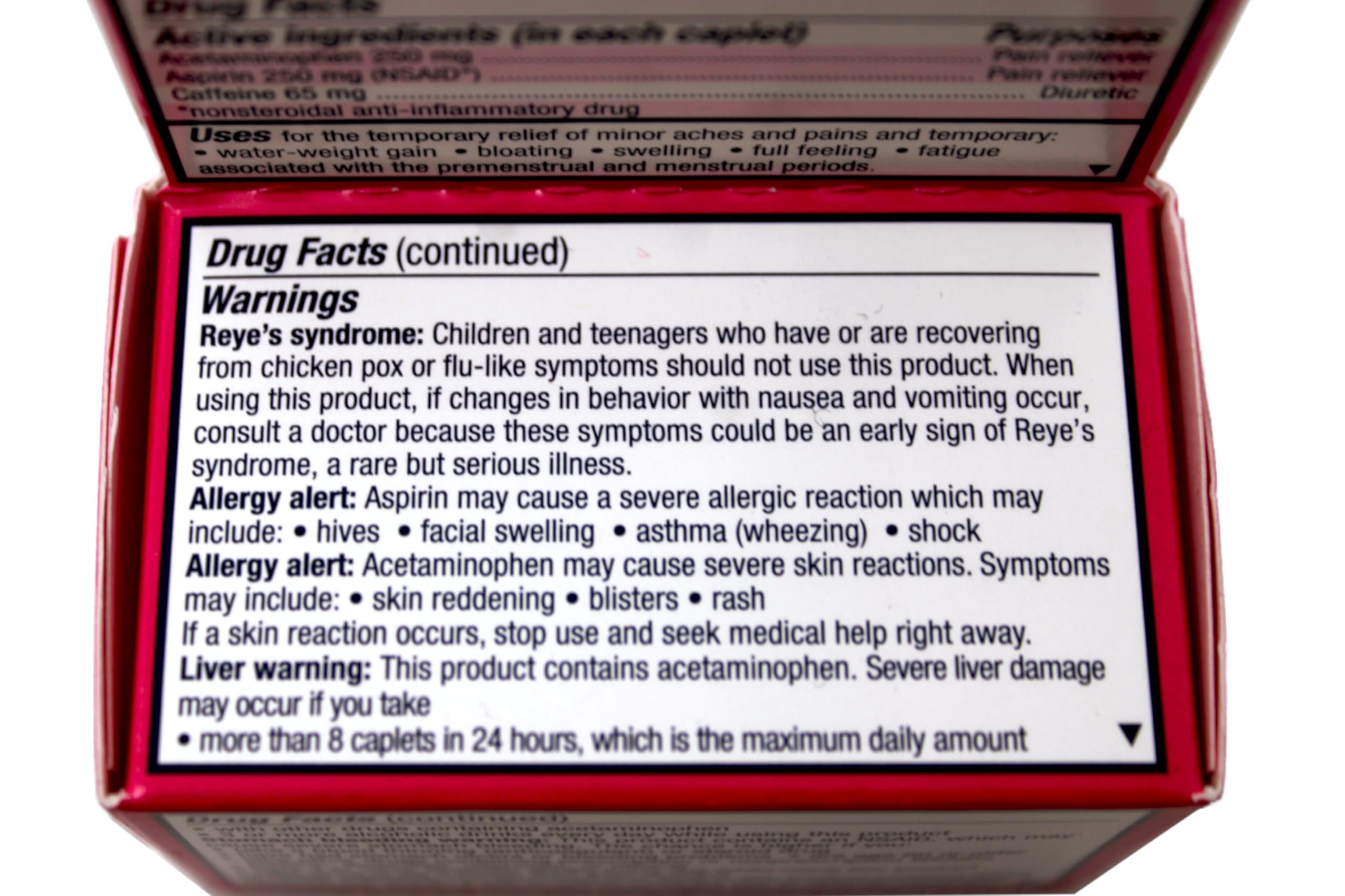 Side view of Pamprin Max menstrual relief box containing 24 pink caplets.