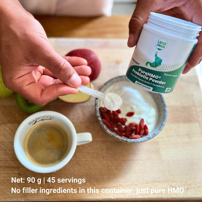 Layer Origin PureHMO prebiotic fiber powder scoop and packaging