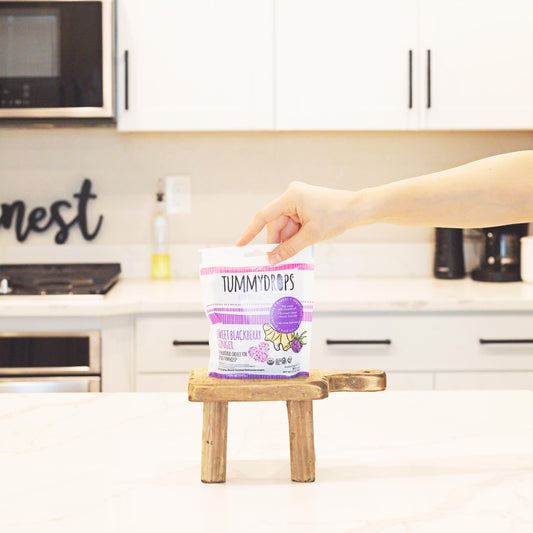 Close up of individually wrapped organic ginger lozenges for travel motion sickness