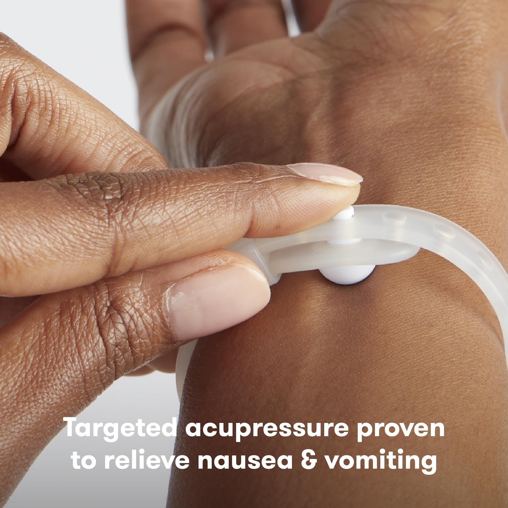 Frida Mom Anti-Nausea Bands demonstrating the internal acupressure button placement.