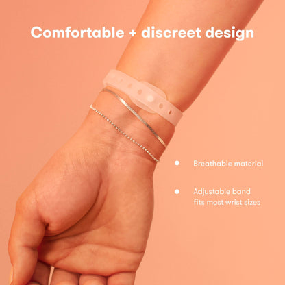 Frida Mom natural non-drowsy nausea remedy bands displayed on a neutral background.