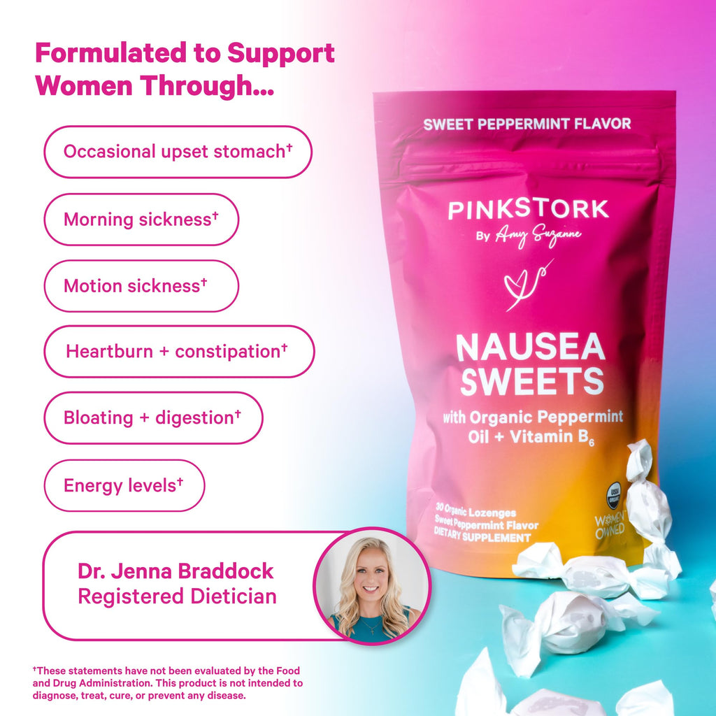 Individually wrapped Pink Stork peppermint drops for morning sickness support scattered on a clean surface