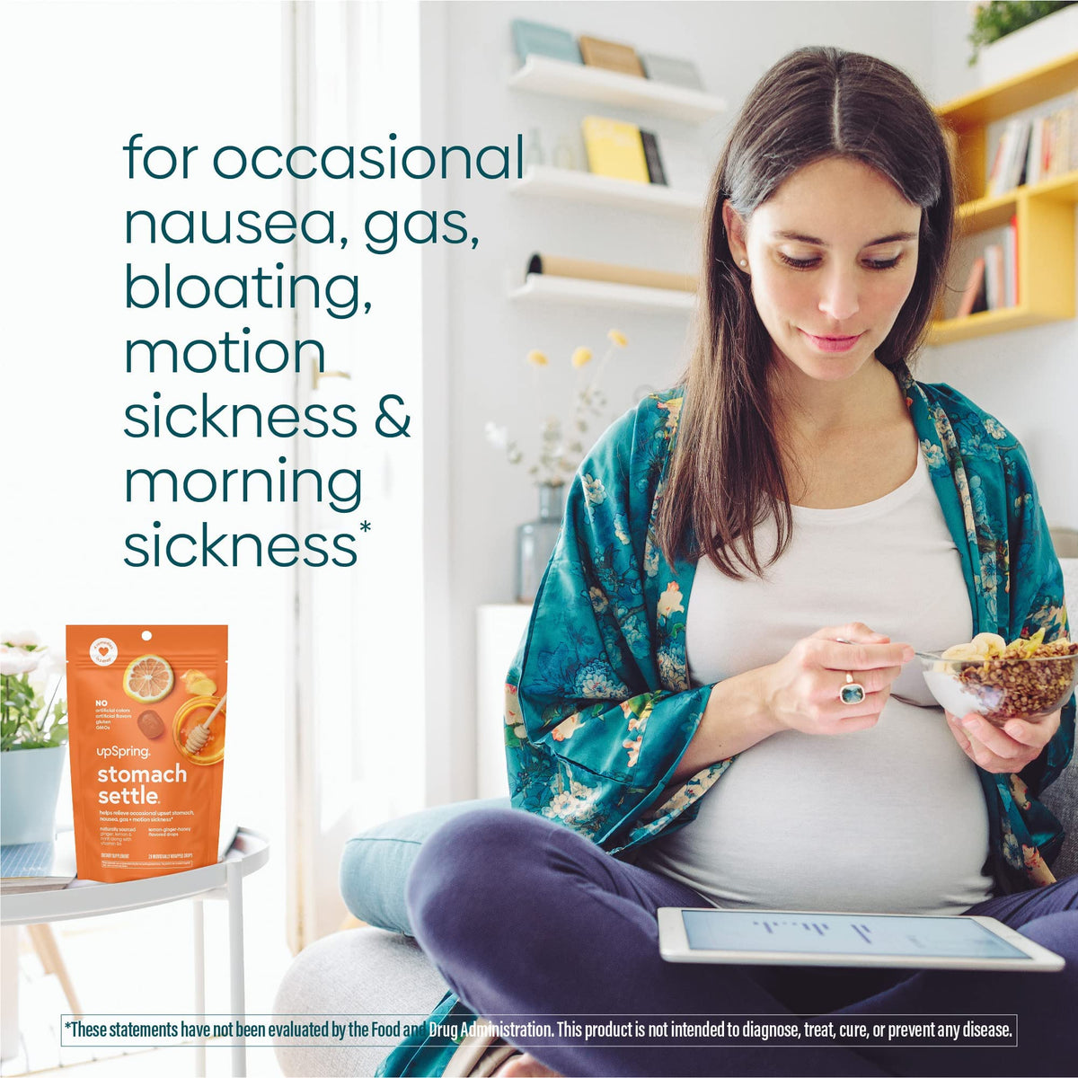 UpSpring motion sickness and bloating relief drops product back view with usage instructions.