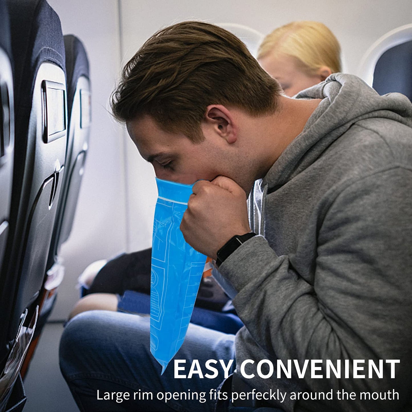 Cloudberg medical grade nausea bags folded compactly next to a travel backpack.