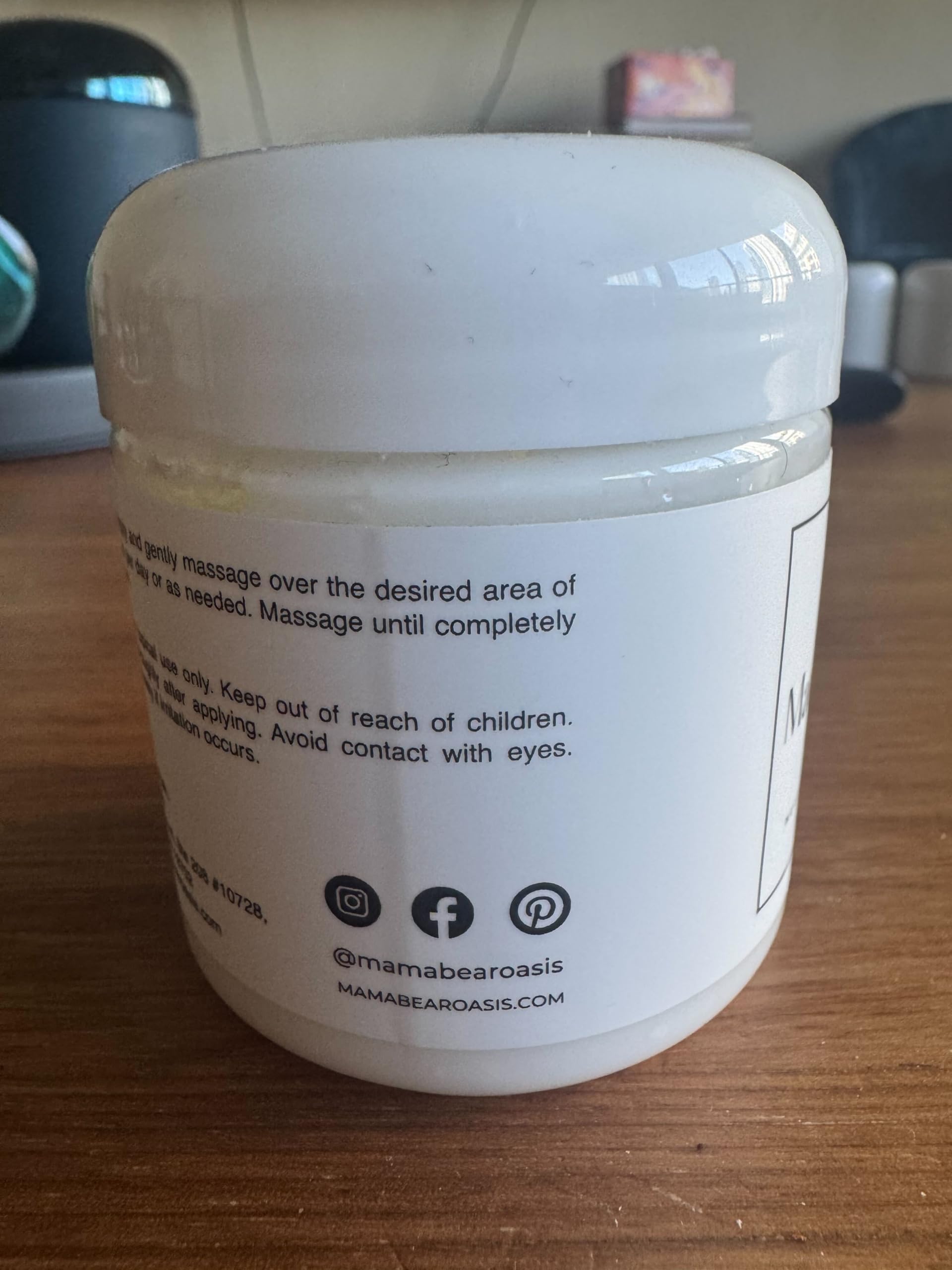 Mama Bear Oasis Neuropathy Cream packaging emphasizing the non greasy formula with lavender oil and chamomile.