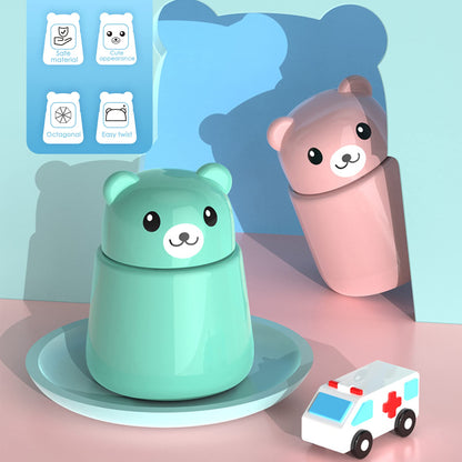 Side view of the travel-friendly pink pill cutting and grinding accessories.