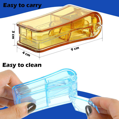 Open translucent medicine splitter displaying the V shaped tablet holder and safety blade guard.