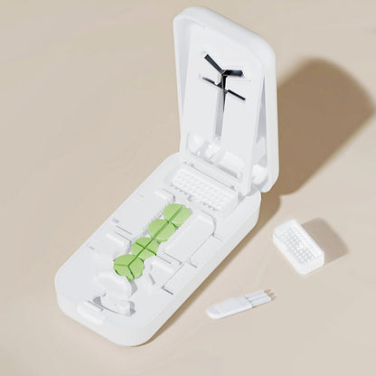 YULIKIKER compact healthcare tool being used to split small round tablets