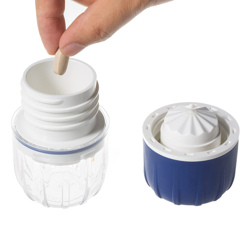 MAXGRIND manual vitamin crusher demonstrating the free spin pepper grinder style motion