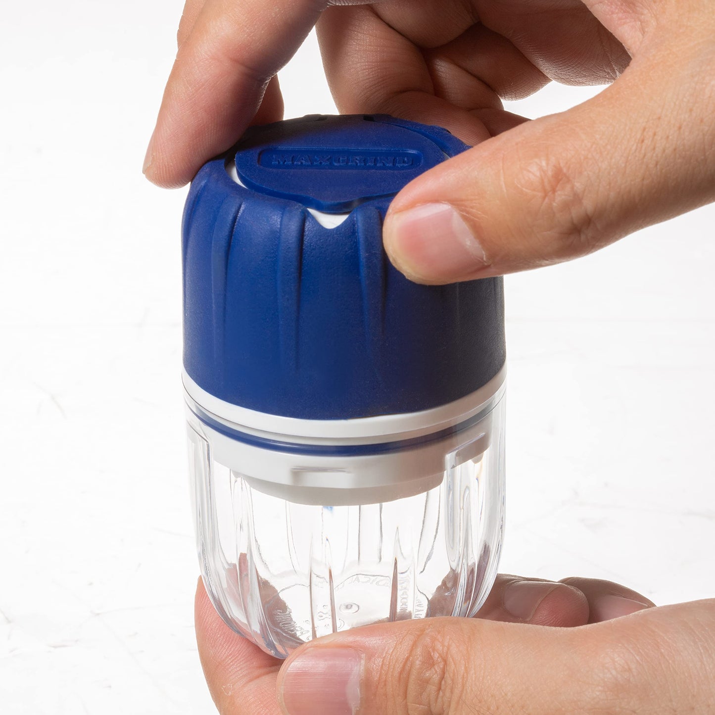 MAXGRIND blue pill pulverizer disassembled to show FDA compliant food grade plastic pieces