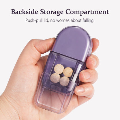 ColeMela travel pill splitter with the integrated cleaning brush detached from its slot.