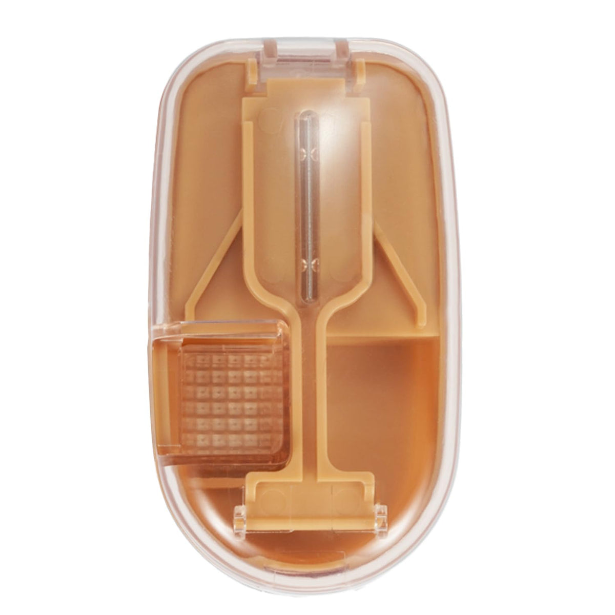 ColeMela portable pill splitter showing different sizes of tablets positioned for a precise cut.