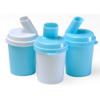 Packaging and assembly view of the imported Oralflo pill assistance device for easy medicine intake