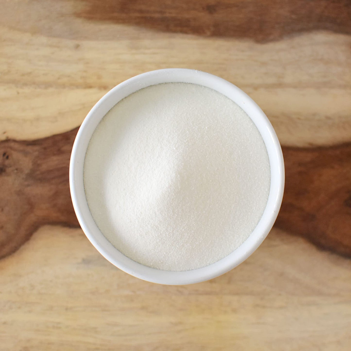 Grass-fed type I and III collagen supplement bag highlighting gluten free certification.