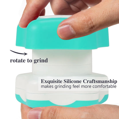 Portable tablet pulverizer device with top lid open showing integrated storage compartment