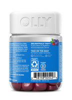 Authentic OLLY plump berry wellness gummies displayed on a clean modern surface
