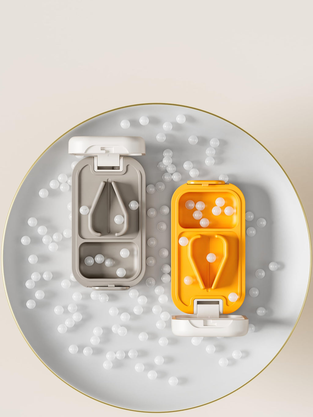 Vilosa vitamins splitter being cleaned with the included mini dust brush