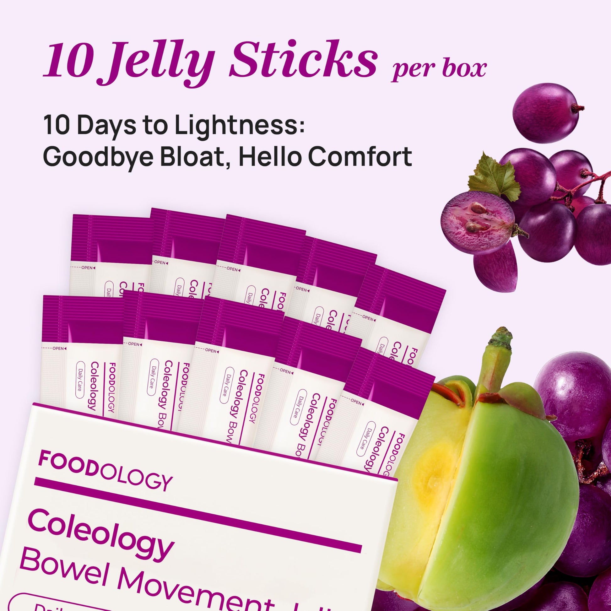 FOODOLOGY bowel movement jelly sticks arranged next to fresh grapes and prunes.