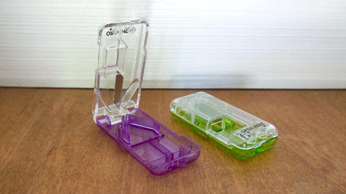 EZY DOSE travel size tablet splitter showcasing the built in medication storage compartment