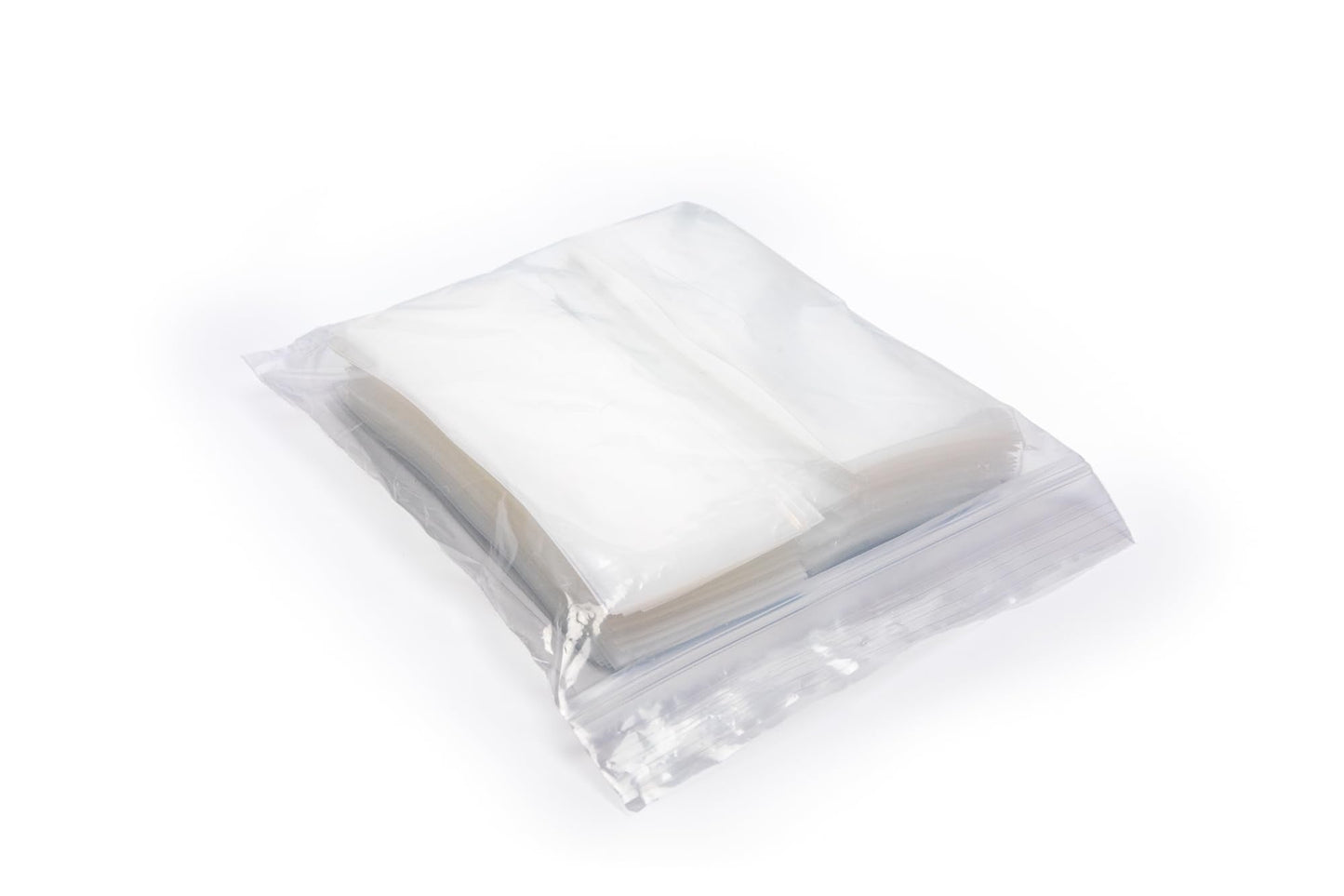 Clear plastic medication pouches containing crushed fine vitamin powder