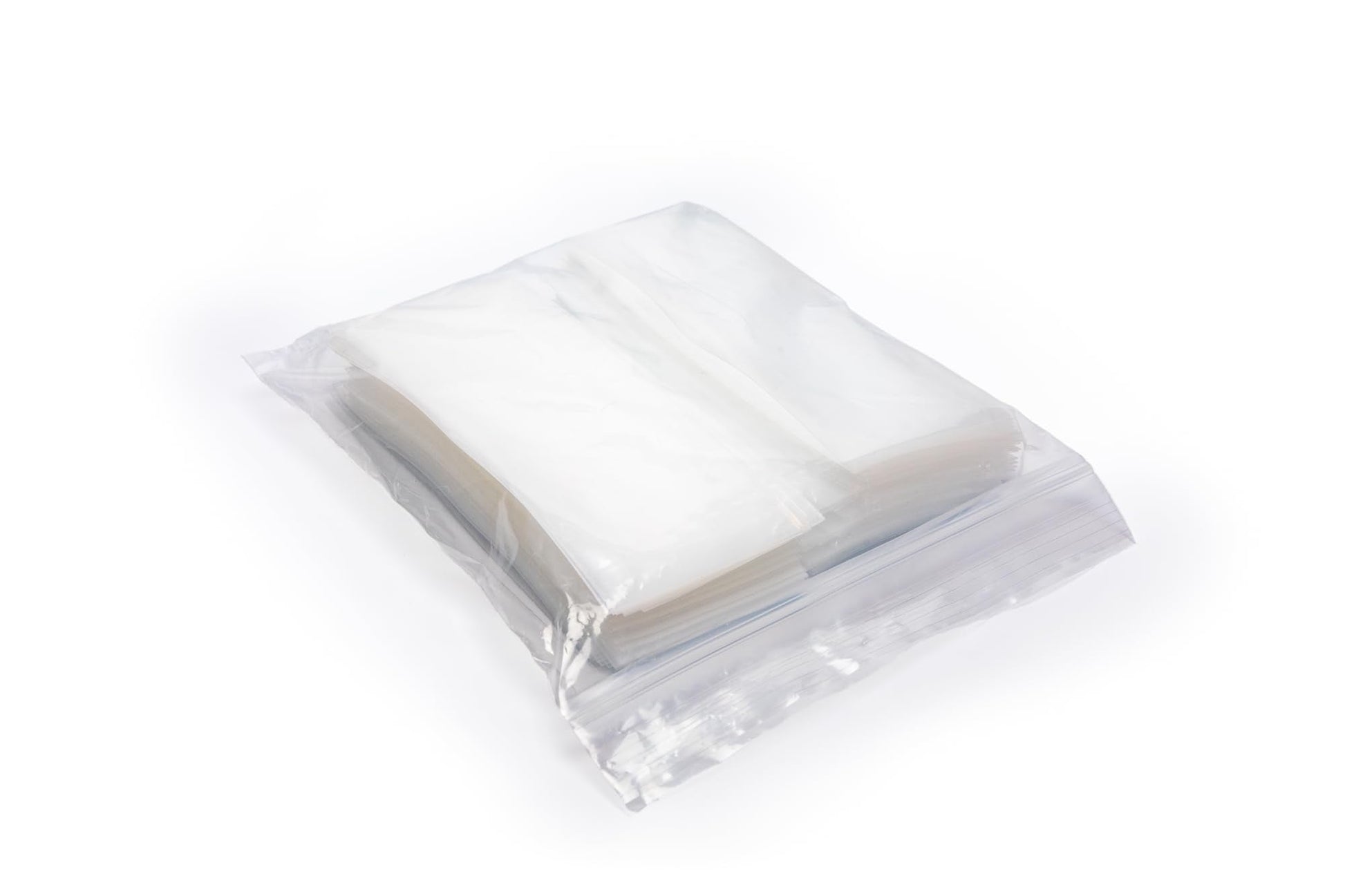 Clear plastic medication pouches containing crushed fine vitamin powder