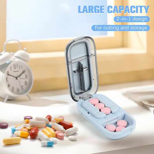 Rexibuz adjustable tablet divider with stainless steel blade cutting a small pill in half