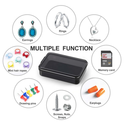 Compact black rectangular pill boxes holding small jewelry items like earrings.