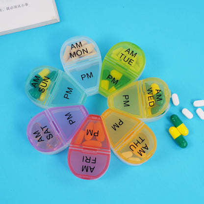 Side view of the secure snap lids on the Zhengyuan 7 day pill organizer highlighting the dustproof seal