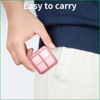 Two pack LINXI travel pill cases packed inside a women handbag pocket
