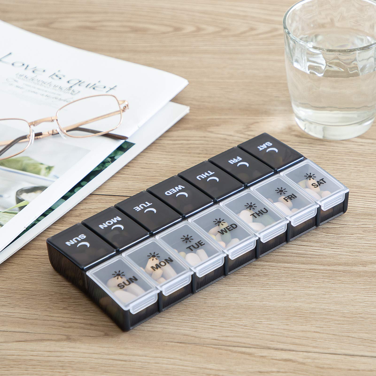 Food-grade medicine case setup for managing multiple daily prescriptions.