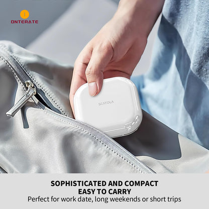 Onterate black travel pill case being placed inside a small purse