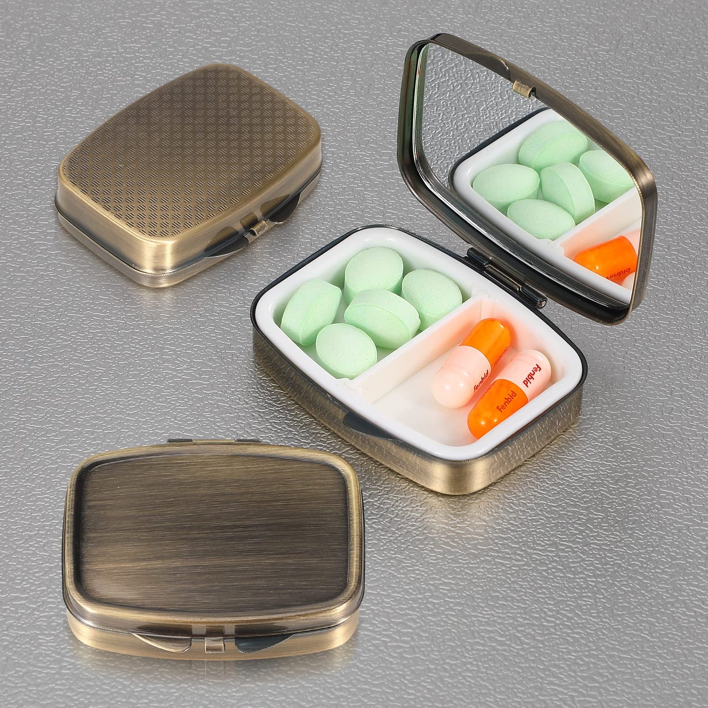 Dynippy portable vitamin organizer with the middle divider removed showing single compartment storage capacity.