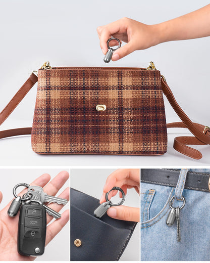 TISUR micro travel pill box demonstrating its lightweight portability next to daily essentials.