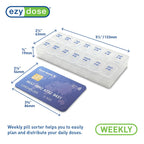 Ezy Dose medium medicine box open lids displaying morning and evening weekly layout slots
