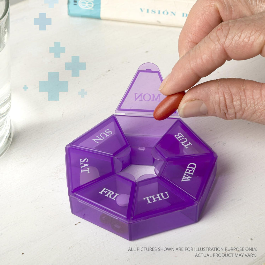 Compact travel vitamin container by Deke Home held in hand to show size