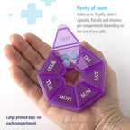 BPA free daily pill box with bold day labeling and braille text details