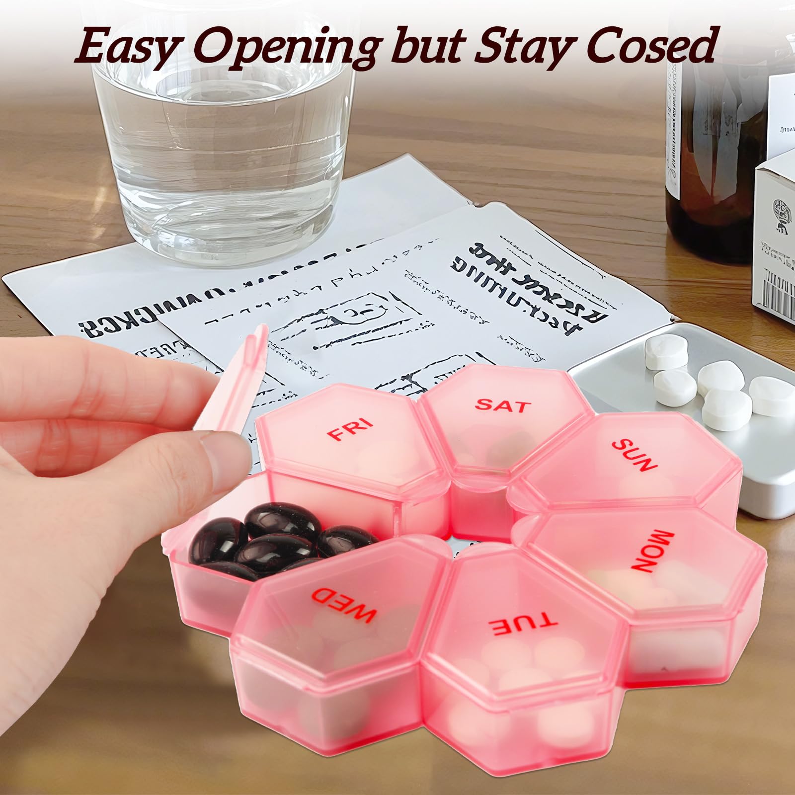 Zuiaso 7-sided medicine planner box being held in hand to showcase its compact and portable travel size