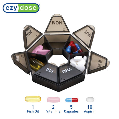 Compact EZY DOSE vitamin planner being placed inside a travel bag to showcase its portable travel friendly size.