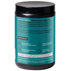 Scoop of powdered ketogenic supplement next to jar