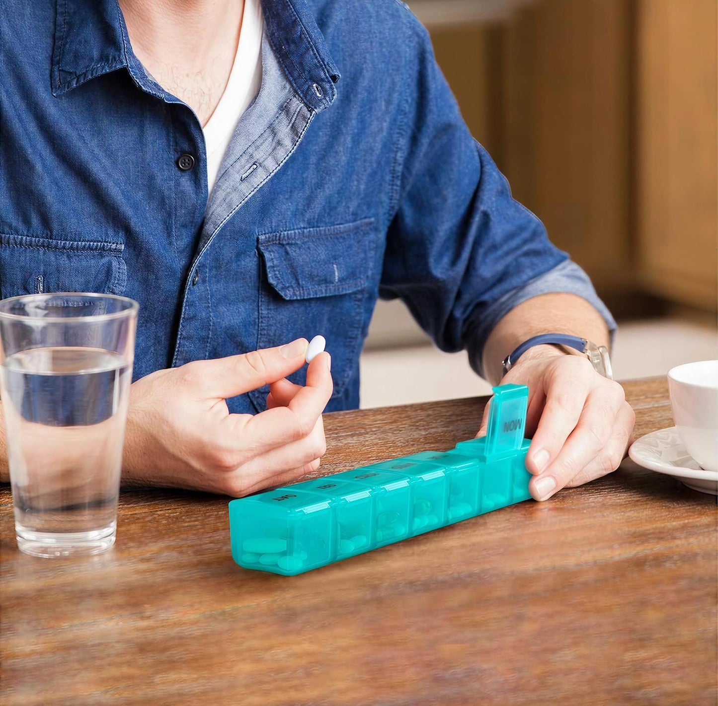 Bug Hull XL pill organizer pack of two showing secure snap closure lock system