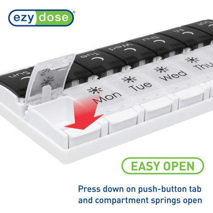 Ezy Dose daily AM PM medicine planner placed on a flat countertop demonstrating the secure one touch push button functionality.