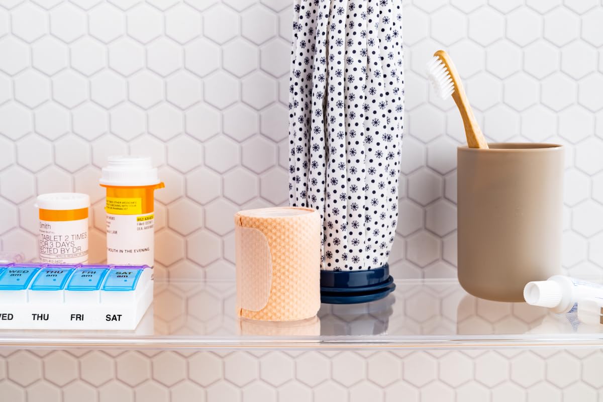 Ezy Dose small pop out pill organizer showing Braille markings on lids