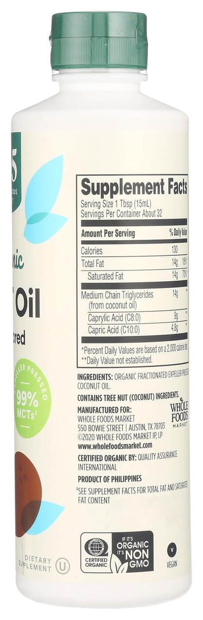 Organic MCT oil bottle next to a glass of smoothie