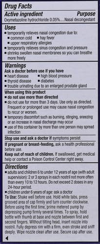 Close up of the pump nozzle on the Afrin decongestant bottle.
